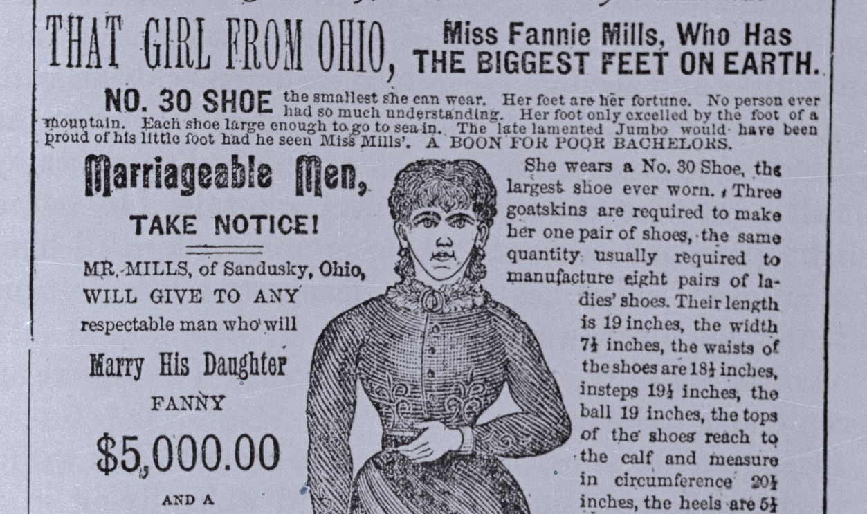 Gettyimages - 517447428, Advertisement for Ohio Character (Original Caption) This is an old time poster with the reading of--That Girl from Ohio, Miss Fannie Mills, who has the biggest feet on earth.