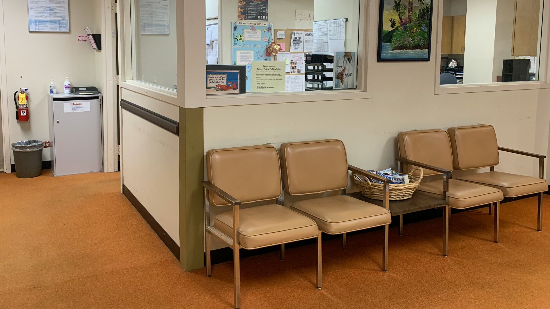 brown and white padded armchairs