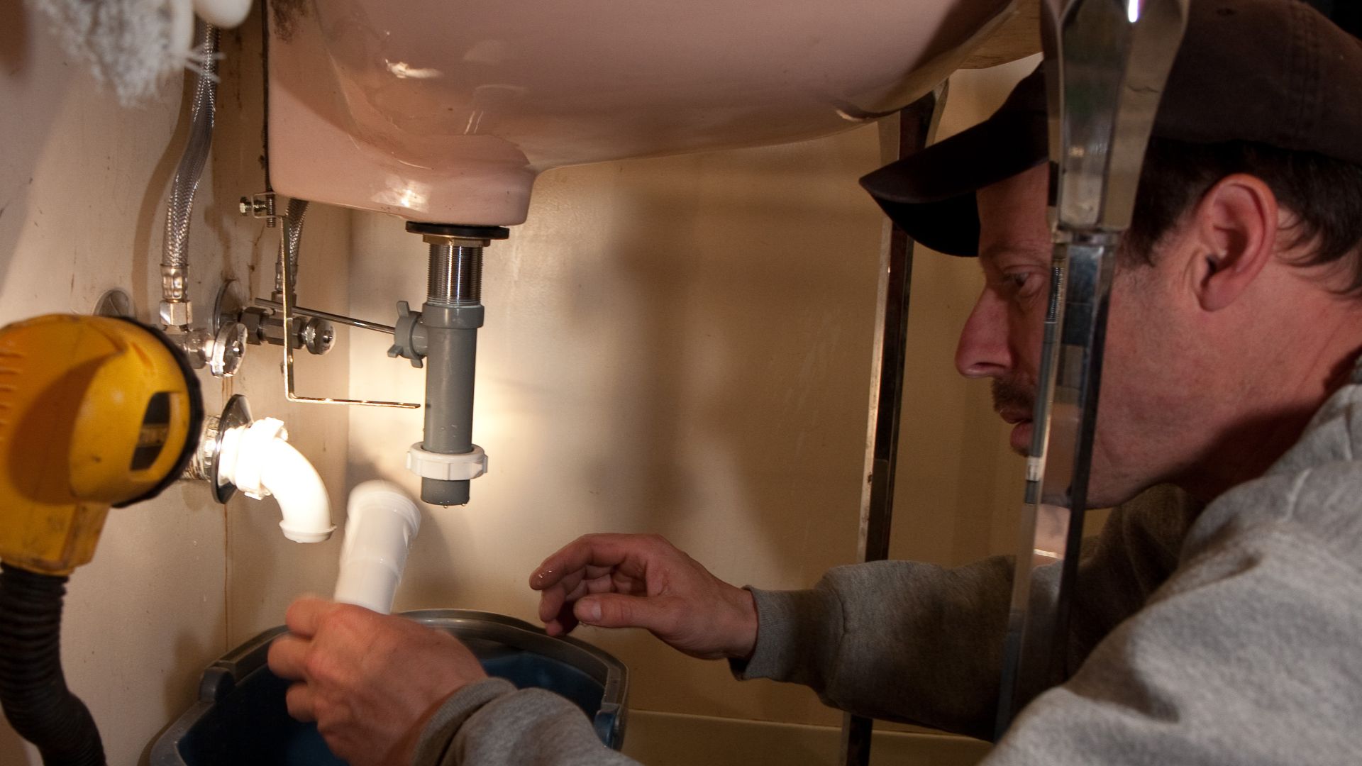 File:Plumber at work 2010 USA.jpg