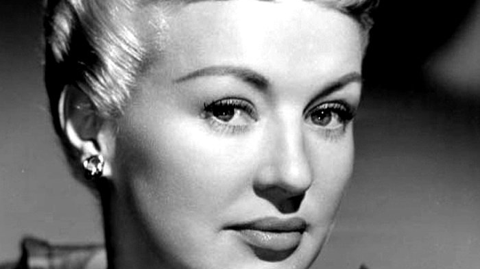 Grayscale Portrait Photo of Betty Grable in a black dress