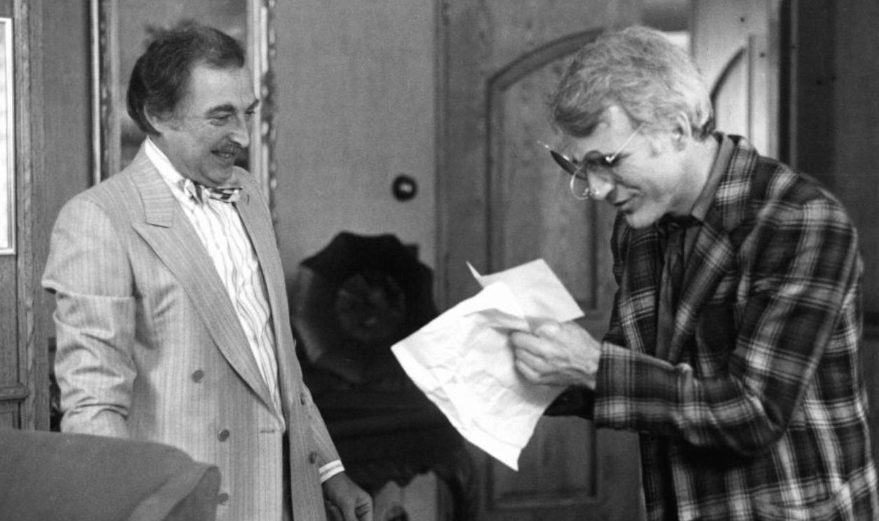 Bill Macy and Steve Martin discuss paperwork in a scene from the film 'The Jerk', 1979.