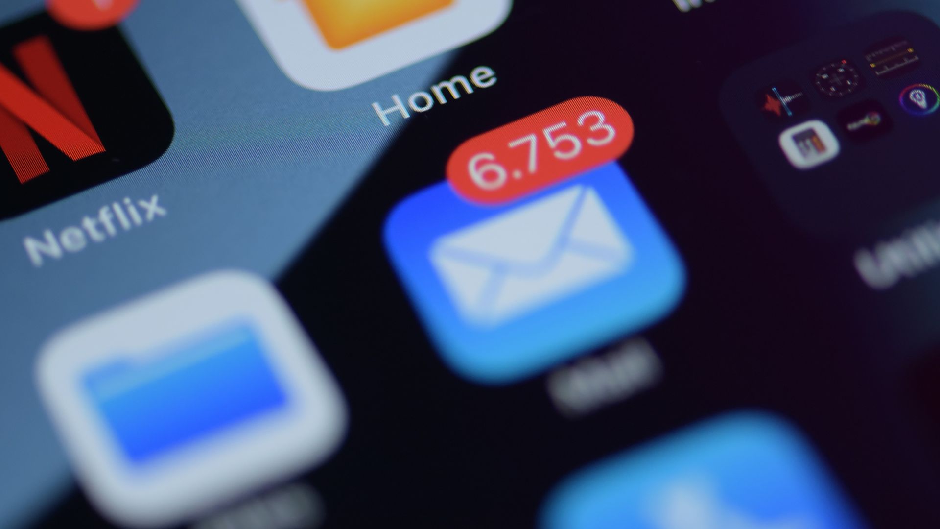 a close up of a cell phone with various app icons