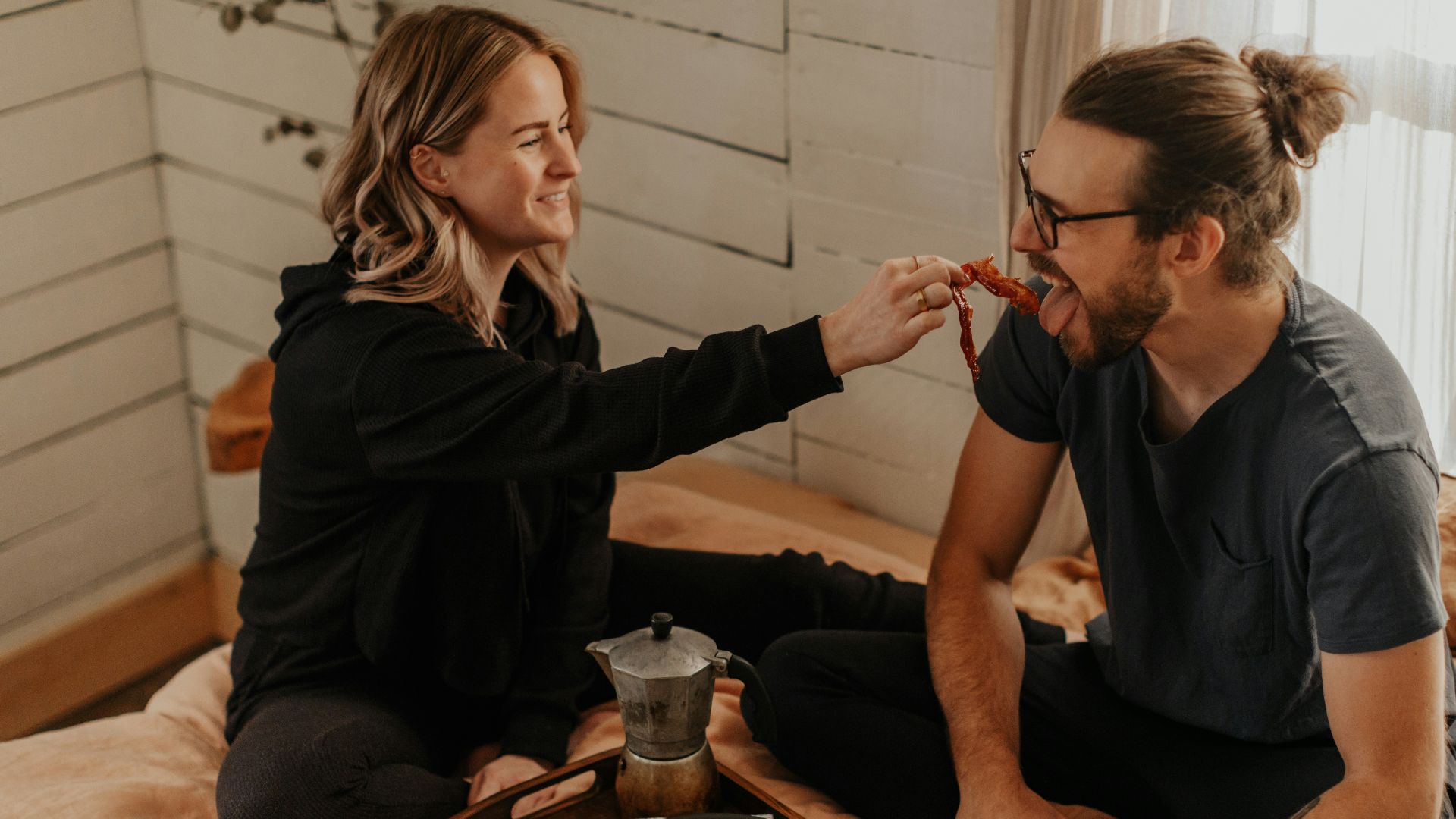 man and woman sitting at table
