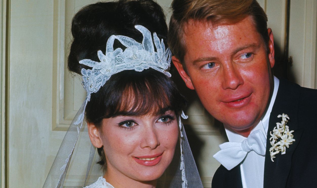 Gettyimages - 515034646, Troy Donahue and Suzanne Pleshette Posing for Camera (Original Caption) Beverly Hills, California: Actress Suzanne Pleshette and actor Troy Donahue are shown following their wedding 1/4. The couple was married in a civil ceremony at the Beverly Hills Hotel attended by 300 invited guests.