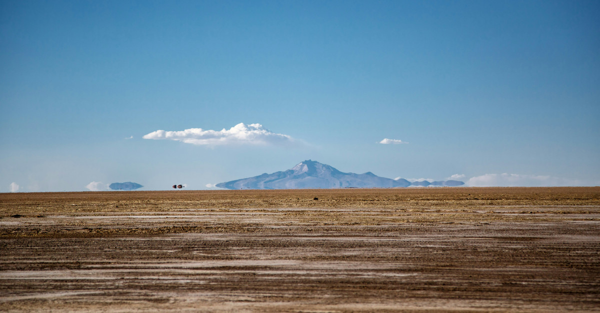 mountain across brown desert