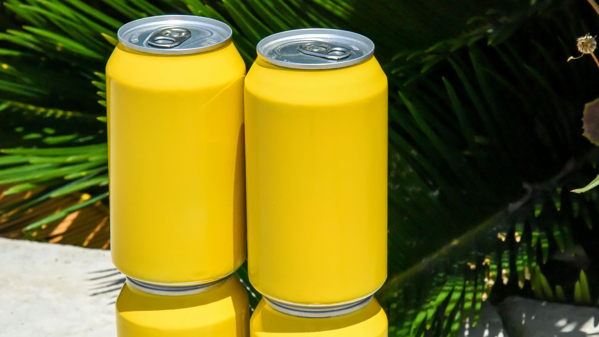 yellow and silver can on white table