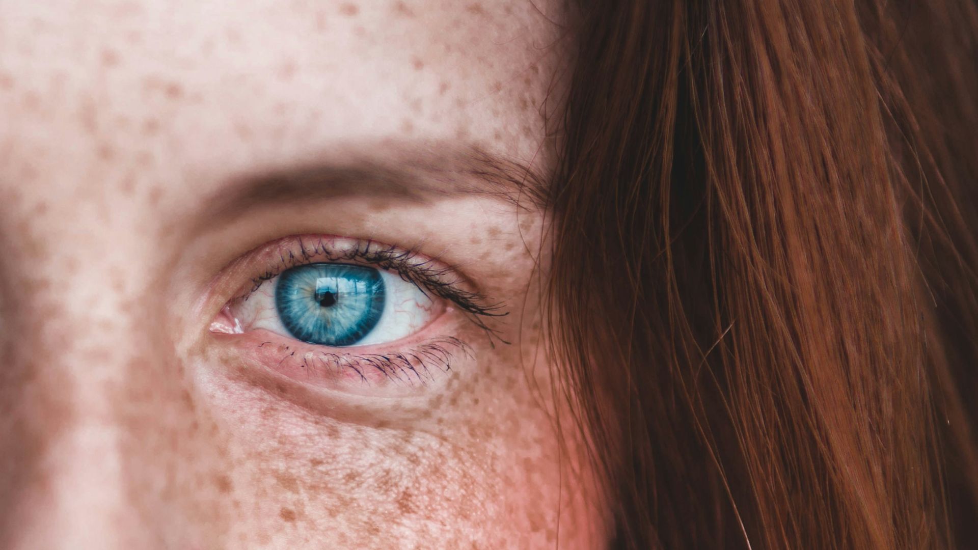 person's blue eye