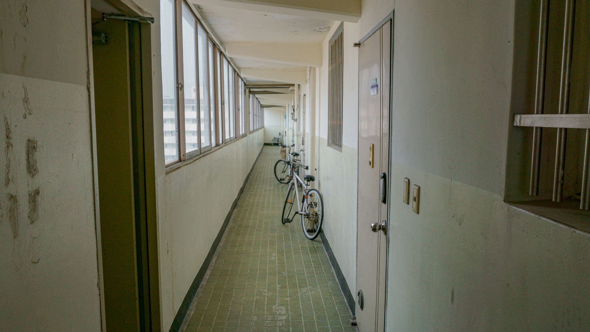 white bicycle on hallway during daytime