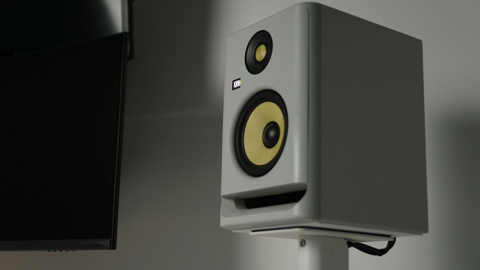 a close up of a speaker on a stand