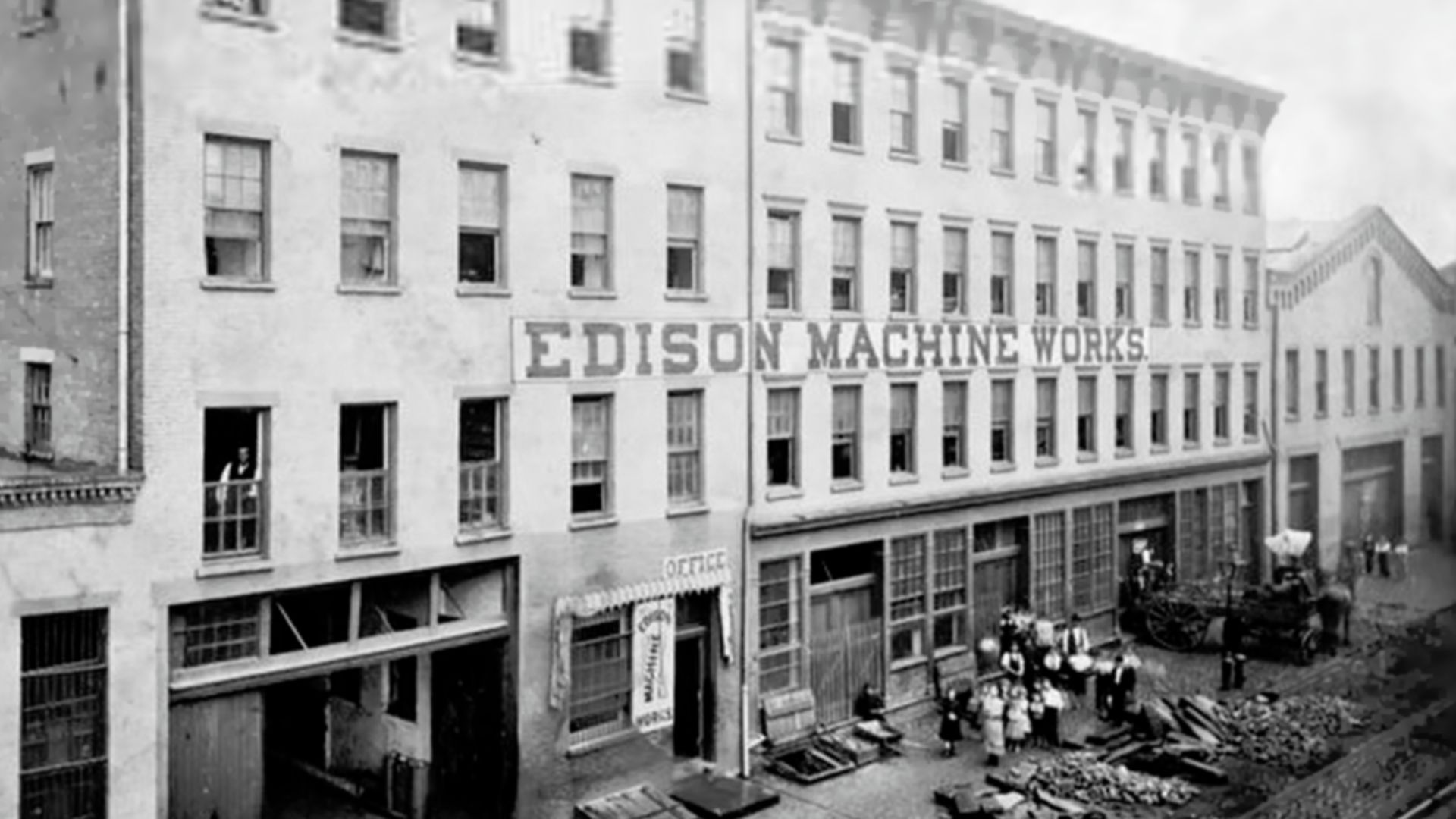An 1881 photograph of the The Edison Machine Works, formerly the Etna Iron Works, located on Goerck Street, Manhattan by Edison employee Charles L. Clarke. 
The Edison Machine Works was a manufacturing company set up to produce dynamos, large electric motors, and other components of the electrical illumination system being built by Thomas A. Edison in New York City in the 1880s.

This section of Manhattan's Lower East Side was cleared in the 1950s to make way for the large Baruch Houses project so the building and Goerck Street itself no longer exists.