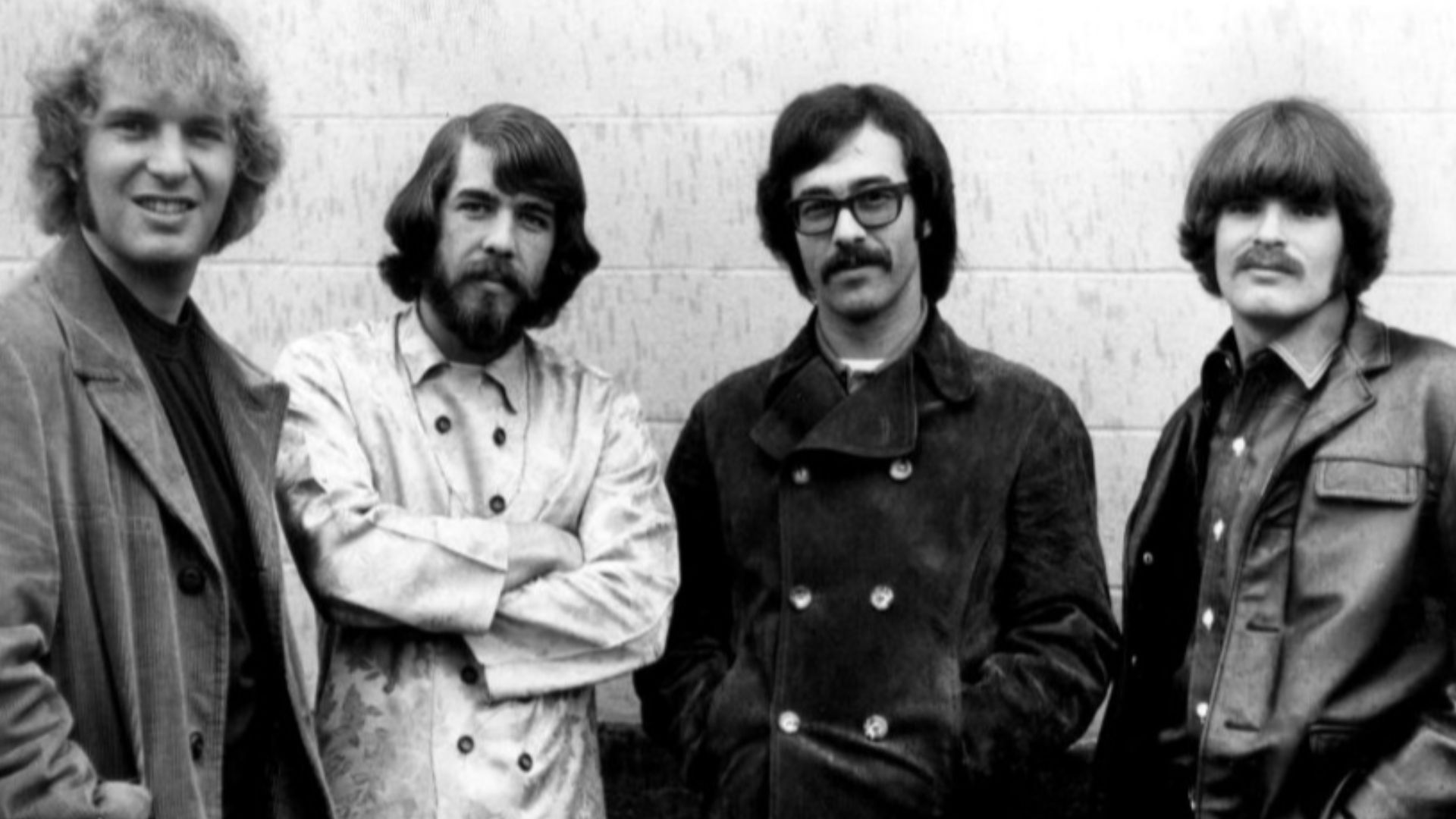 Photograph of Creedence Clearwater Revival (1968). L-R: Tom Fogerty, Doug Clifford, Stu Cook, and John Fogerty.