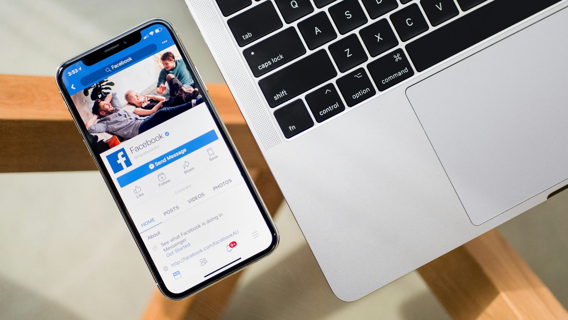 iPhone X beside MacBook