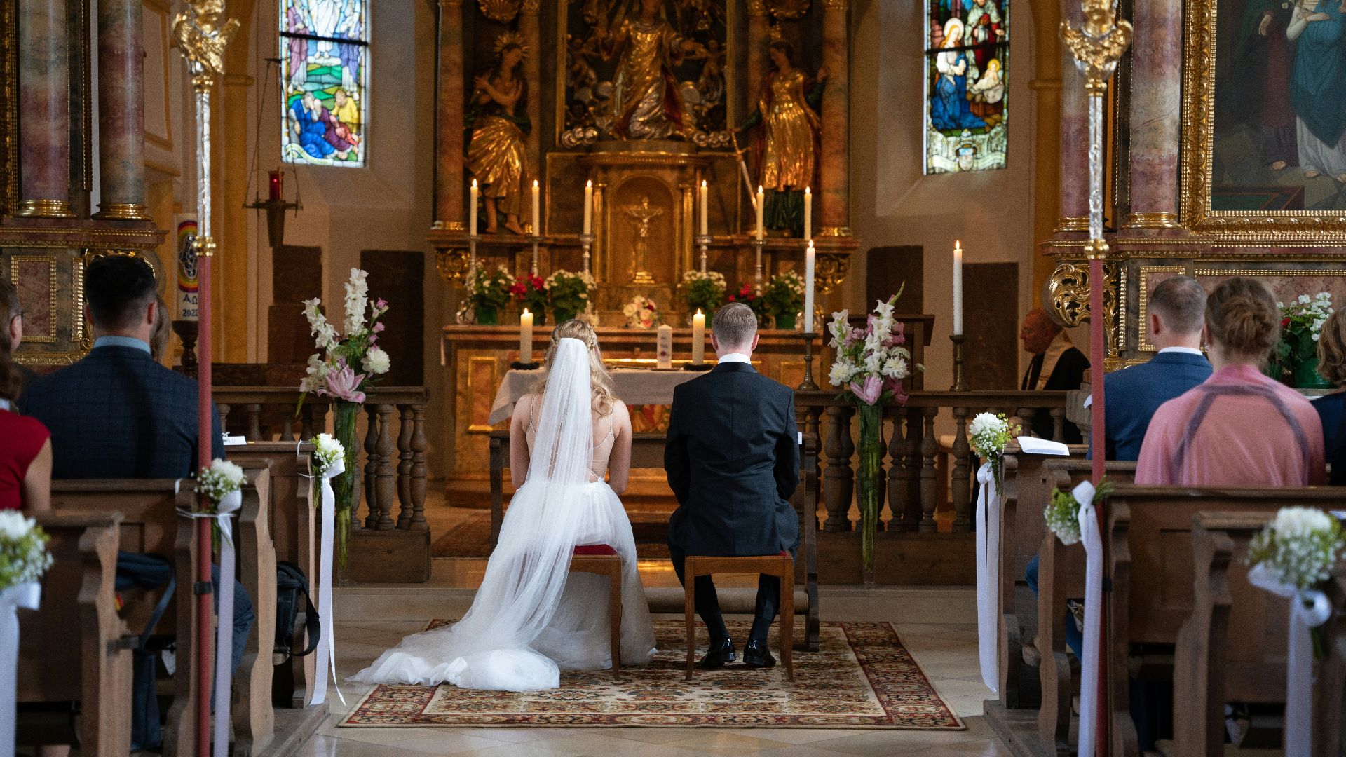 a bride and groom in a church