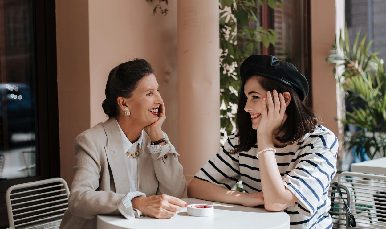A Happy Grandmother and Granddaughter Looking at Each Other