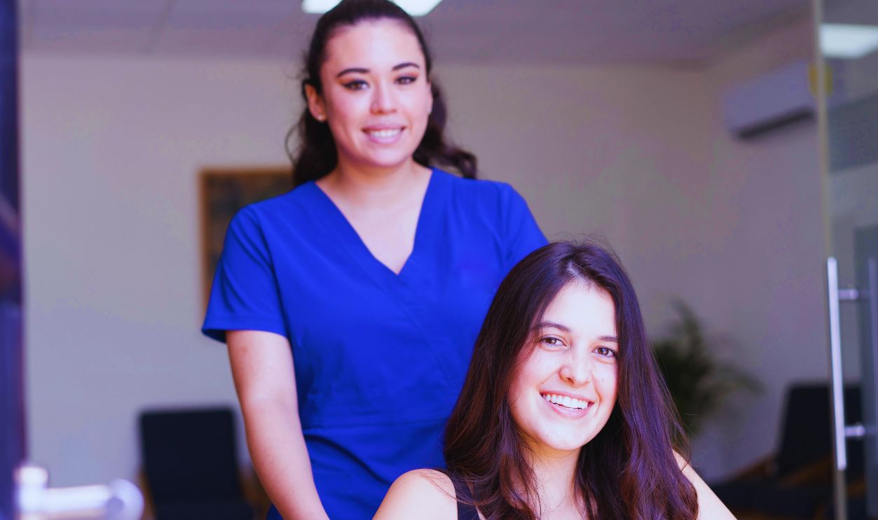 Women Smiling at the Camera