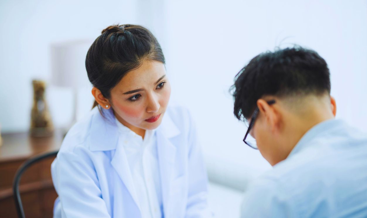 A Woman in White Lab Gown
