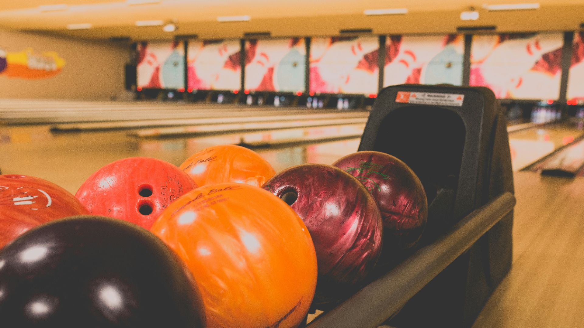 bowling balls on rack