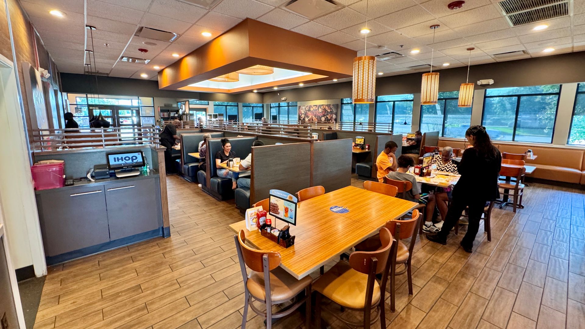 The interior of a modern IHOP (or International House of Pancakes) restaurant in Greenville, South Carolina