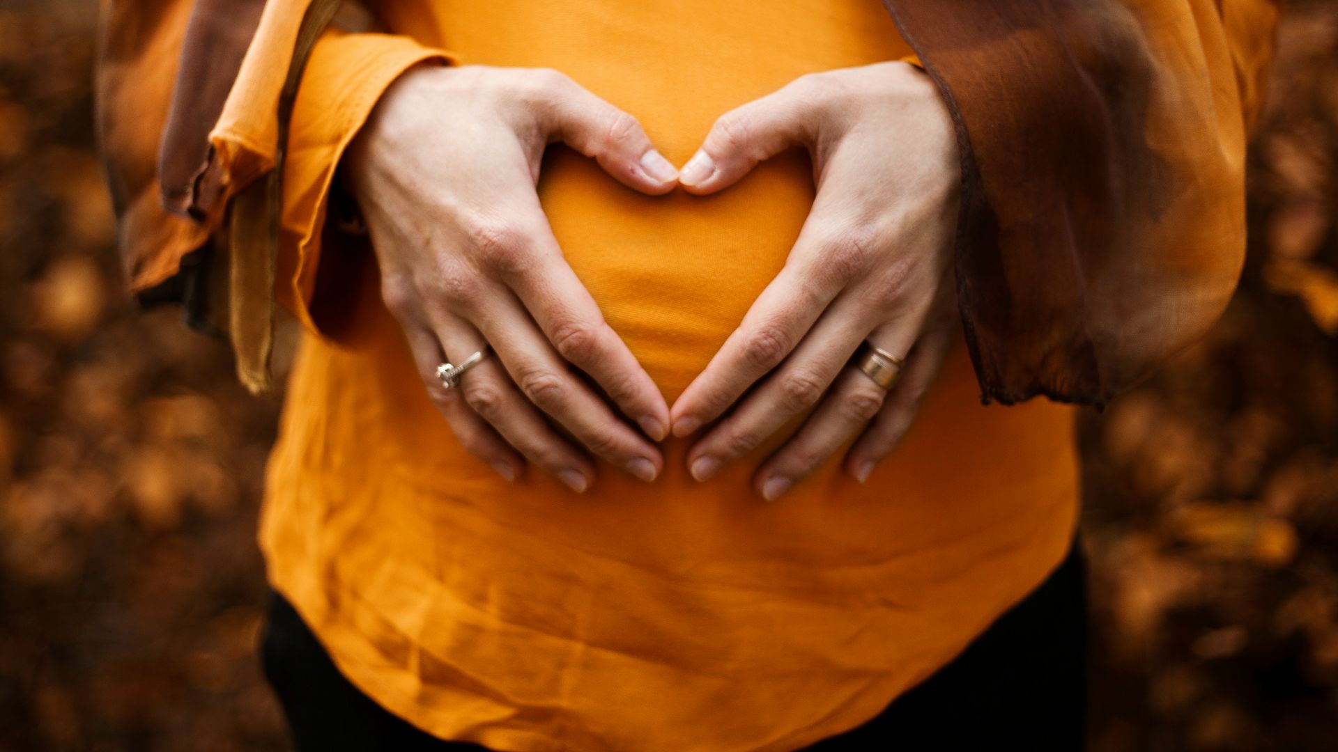 person touching stomach