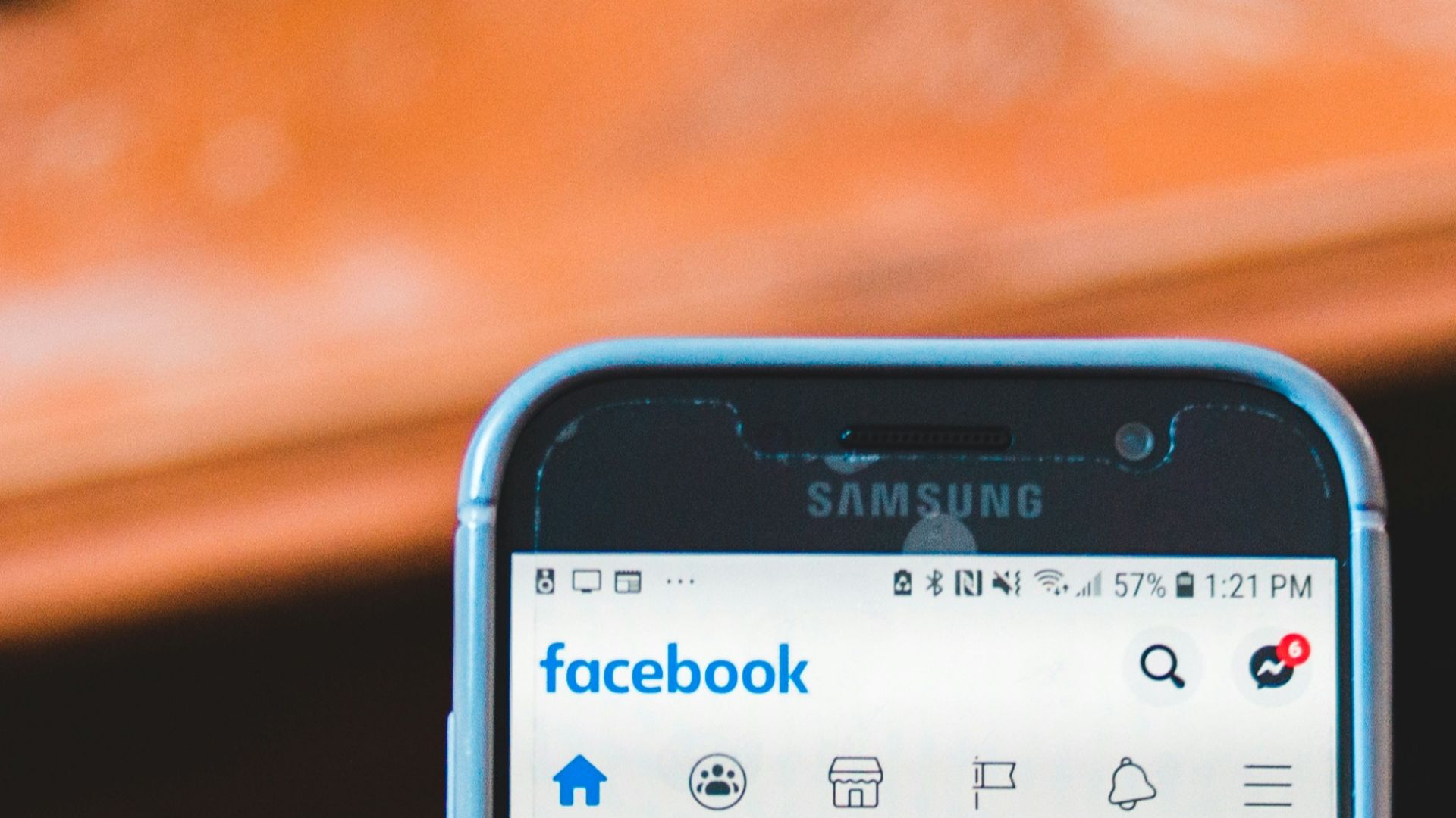 person holding black samsung android smartphone