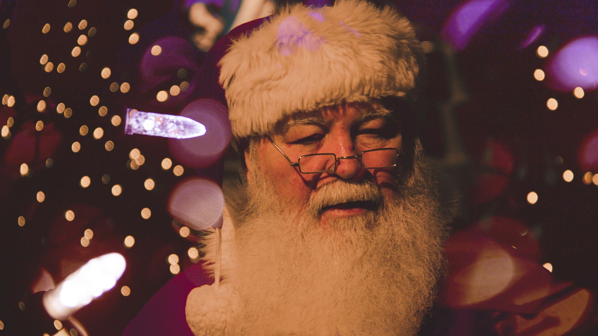 bokeh photography of Santa Claus