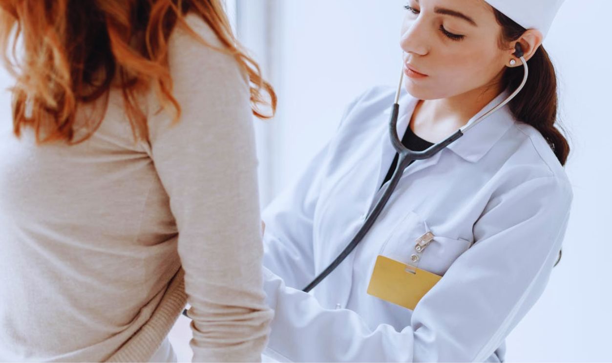 Photo Of Doctor Checking On Her Patient