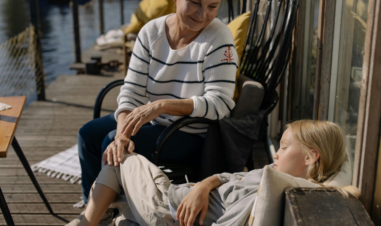 A Grandmother Watching Her Sleeping Granddaughter