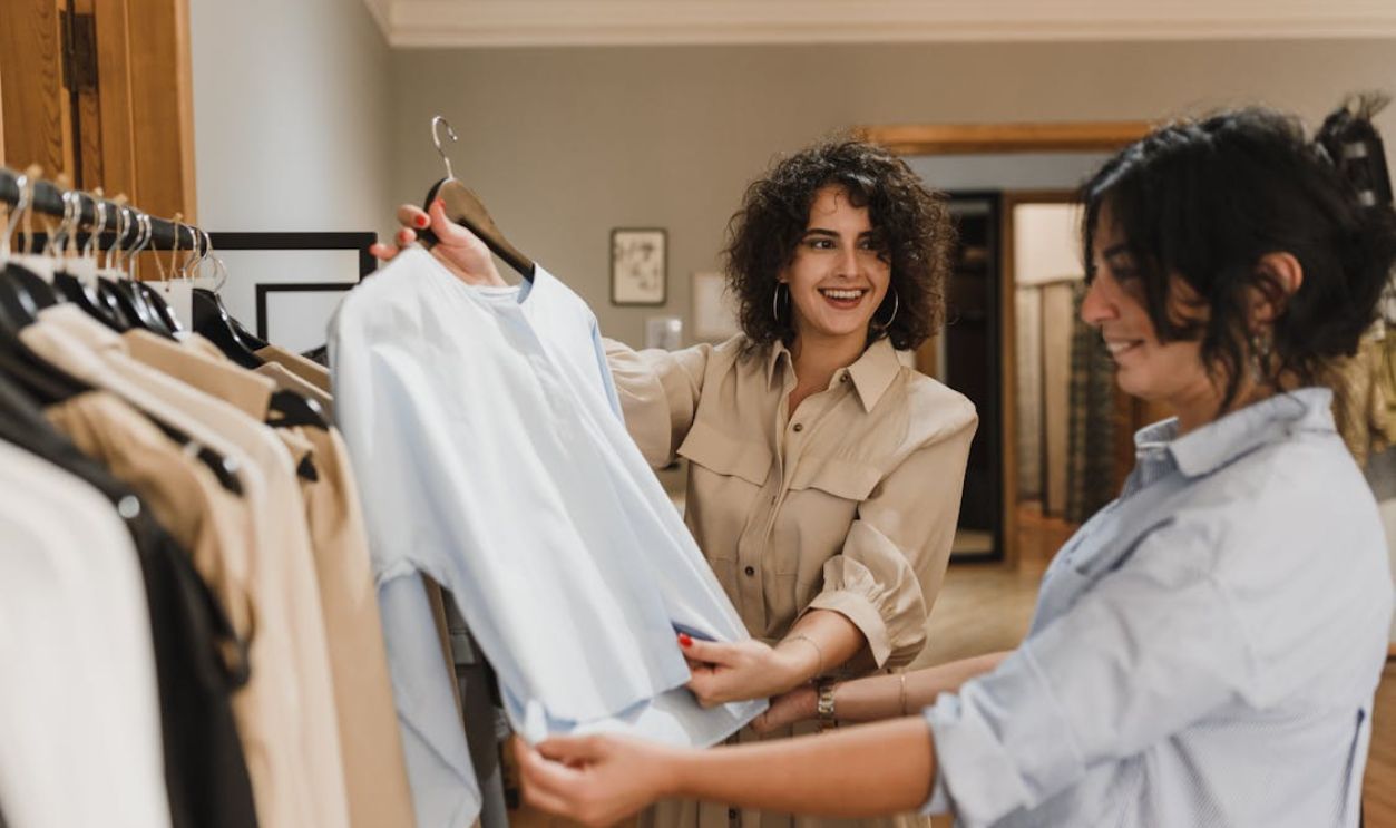 Women Buying Clothes Together