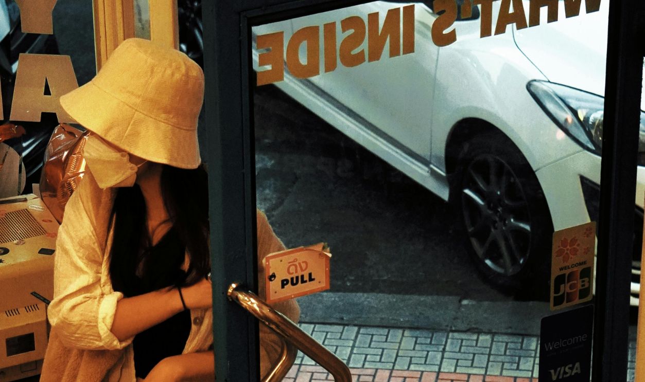 Woman Entering Store