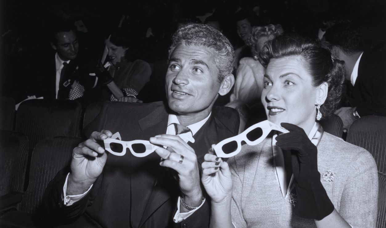  Gettyimages - 3207336, Jeff Chandler 1952: EXCLUSIVE American actor Jeff Chandler (1918-1961) and his wife, Marjorie Hoshelle, hold 3-D glasses while sitting in the audience for the premiere of director Arch Oboler's film, 'Bwana Devil'. 