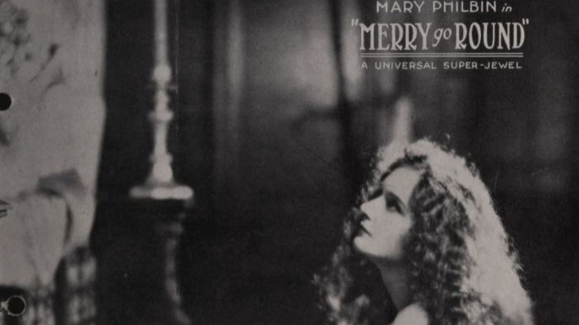 Still from the American film Merry-Go-Round (1923) with Mary Philbin, on the cover of the May 26, 1923 Universal Weekly.