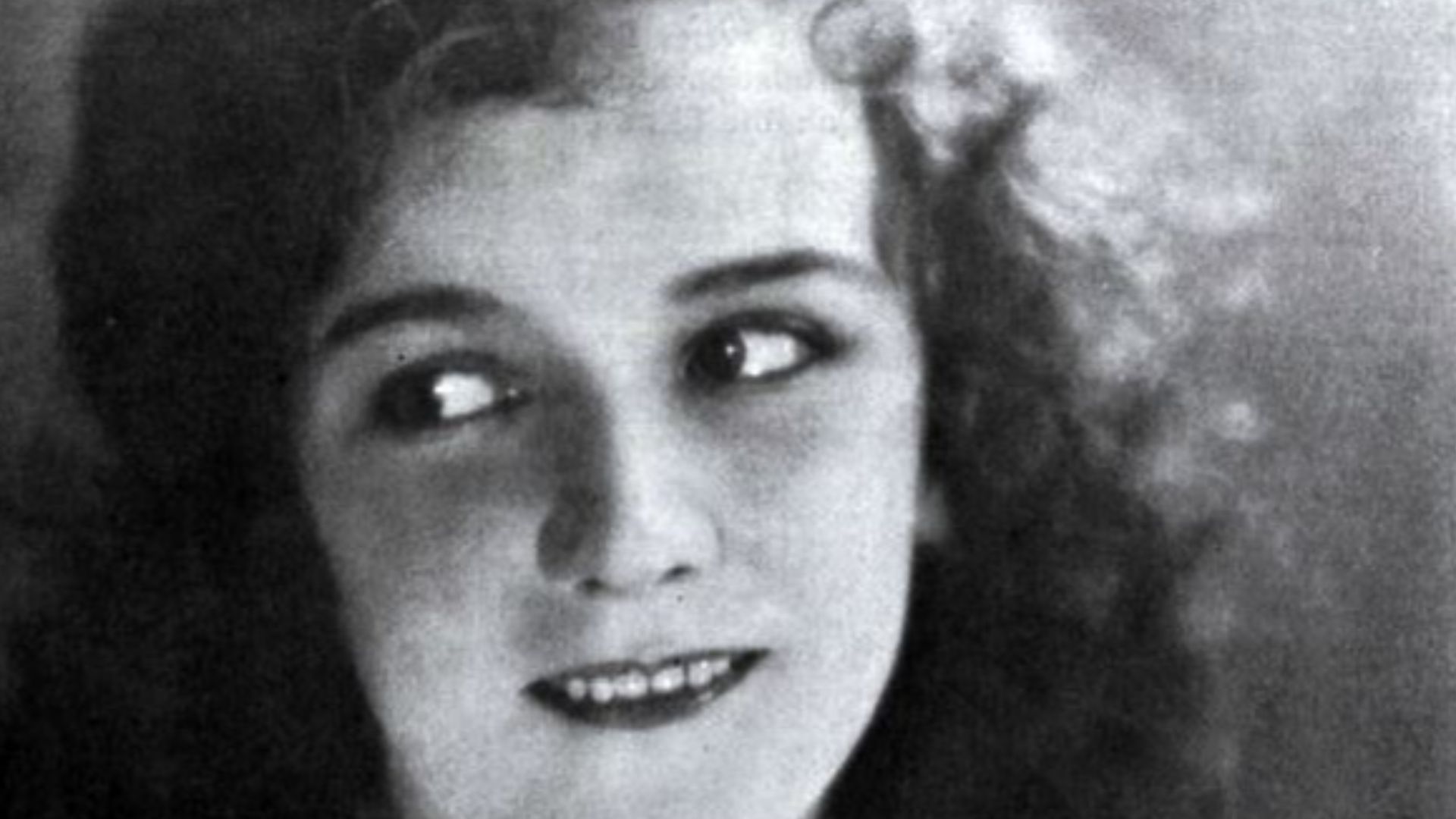 Still from the American romantic film The Gaiety Girl (1924) with Mary Philbin, on page 13 of the June 21, 1924 Universal Weekly.