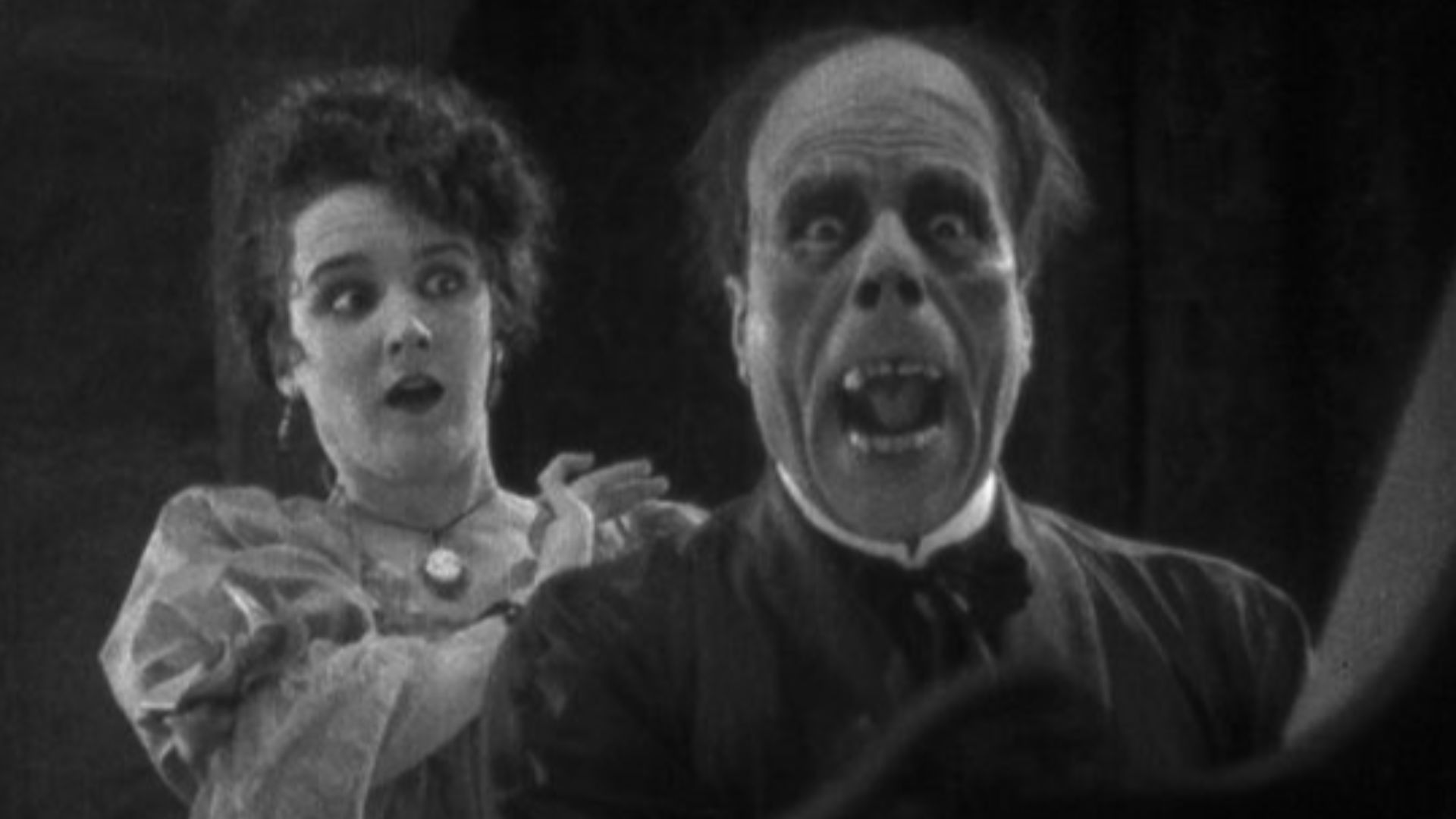 The famous unmasking scene from The Phantom of the Opera (Universal, 1925) with Lon Chaney and Mary Philbin. For comparison, the Eastman House version of the film is shown on the left while the original 1925 version is on the right.