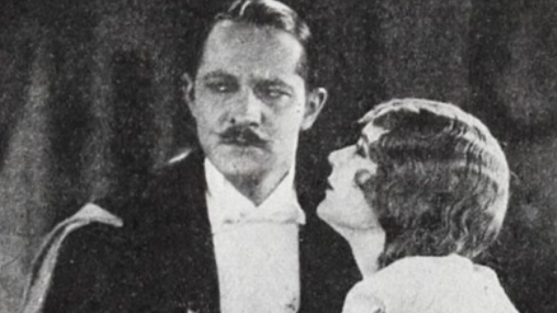 Still from the American horror film The Phantom of the Opera (1925) with Norman Kerry and Mary Philbin, on page 33 of the September 12, 1925 Exhibitors Herald.