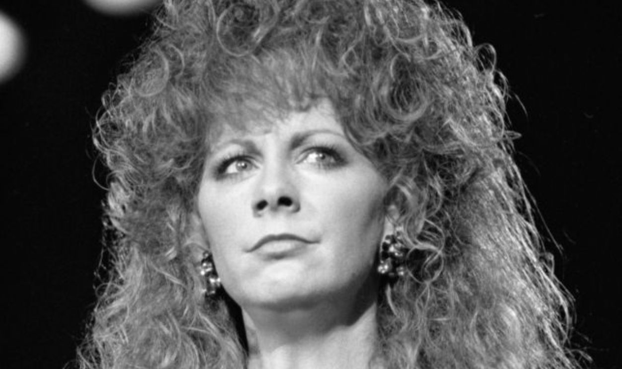 NASHVILLE -August 24: Country Music Singer Songwriter Reba McEntire Performs on August 24, 1990 in Nashville, Tennessee 