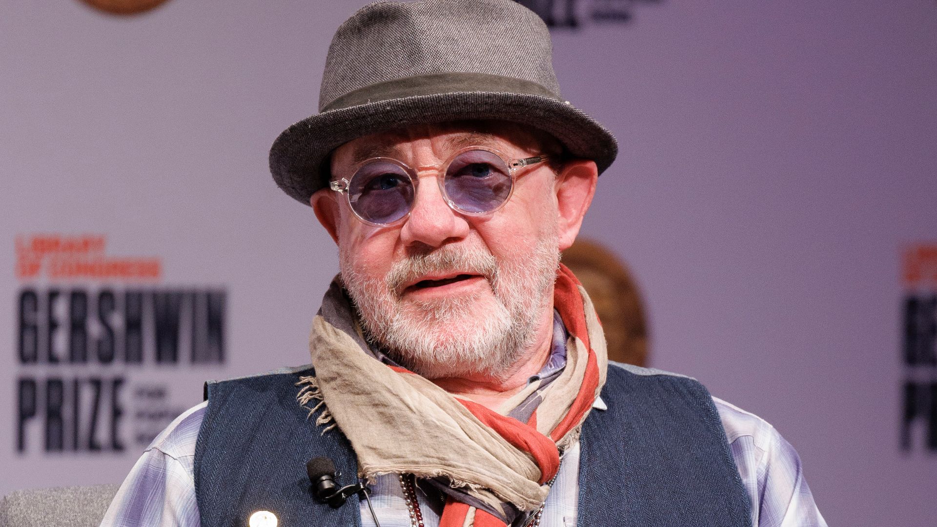 Gershwin Prize for Popular Song honoree Bernie Taupin speaks about his career with Librarian of Congress Carla Hayden during an interview at the Library, March 21, 2024. Photo by Shawn Miller/Library of Congress. 
Note: Privacy and publicity rights for individuals depicted may apply.