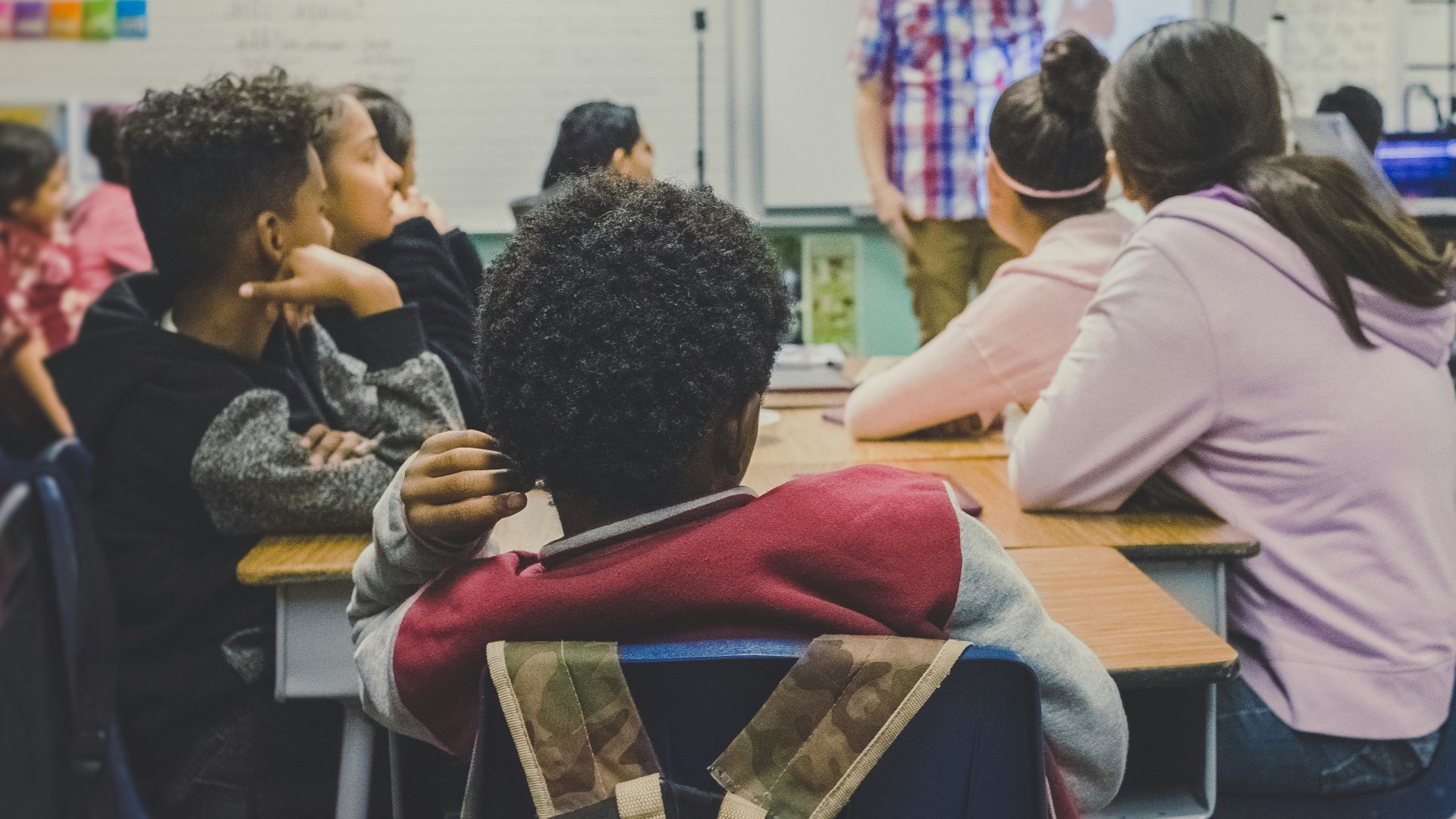 man and woman sitting on chairs