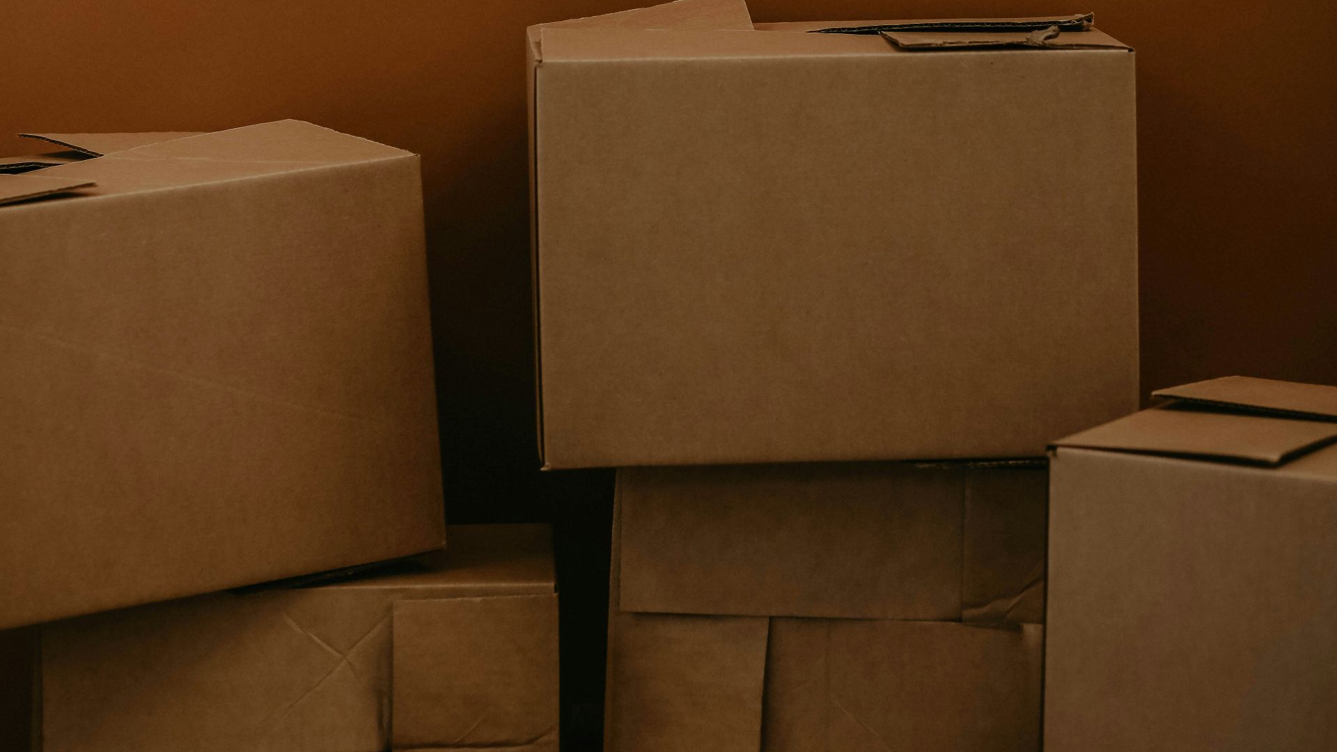 white cardboard box on brown wooden table
