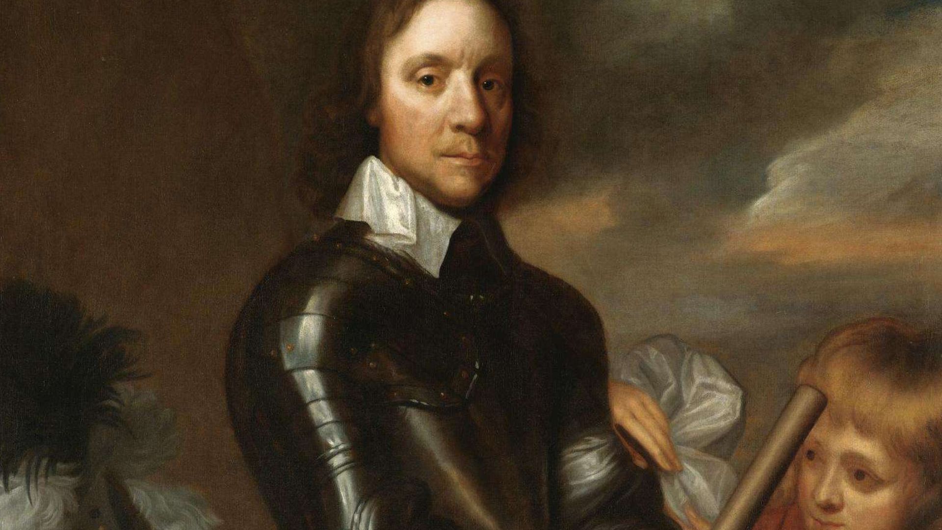 Three-quarter length, standing, wearing armour, a page to the right