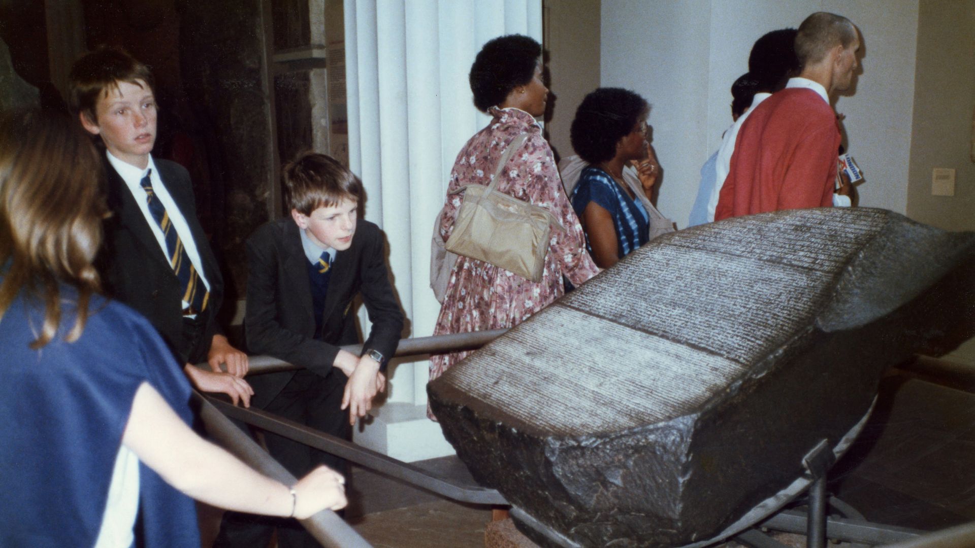 Patrons at the British Museum view the Rosetta Stone in 1985