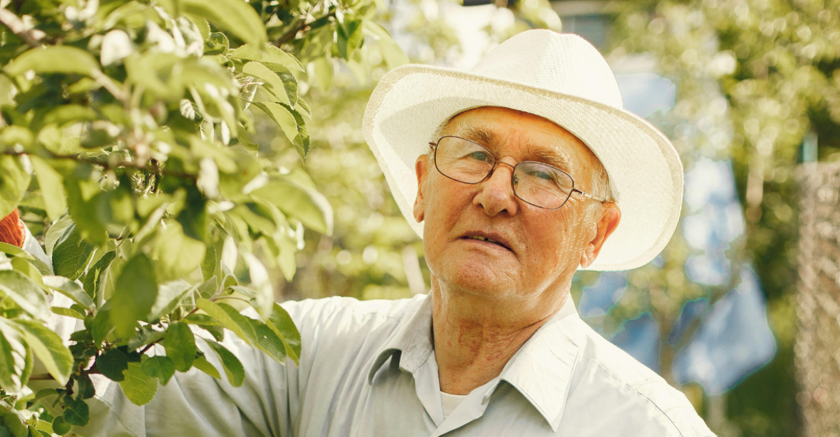 man-in-white-dress-shirt-and-blue-denim-jeans-standing