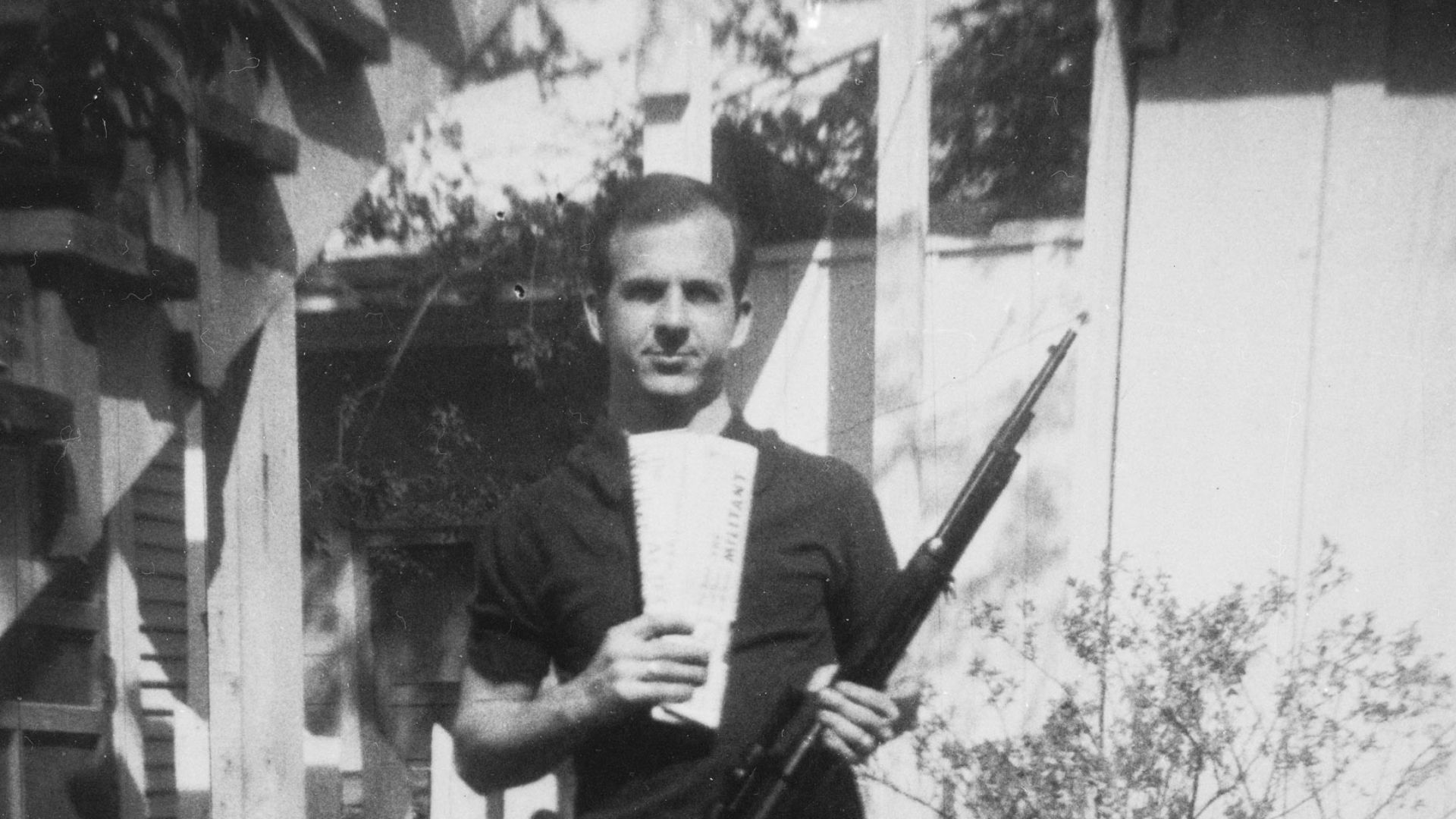 Photo of Lee Harvey Oswald with rifle, taken in Oswald's back yard, Neely Street, Dallas Texas, March 1963.  The photo was Warren Commission exhibit 133-A.