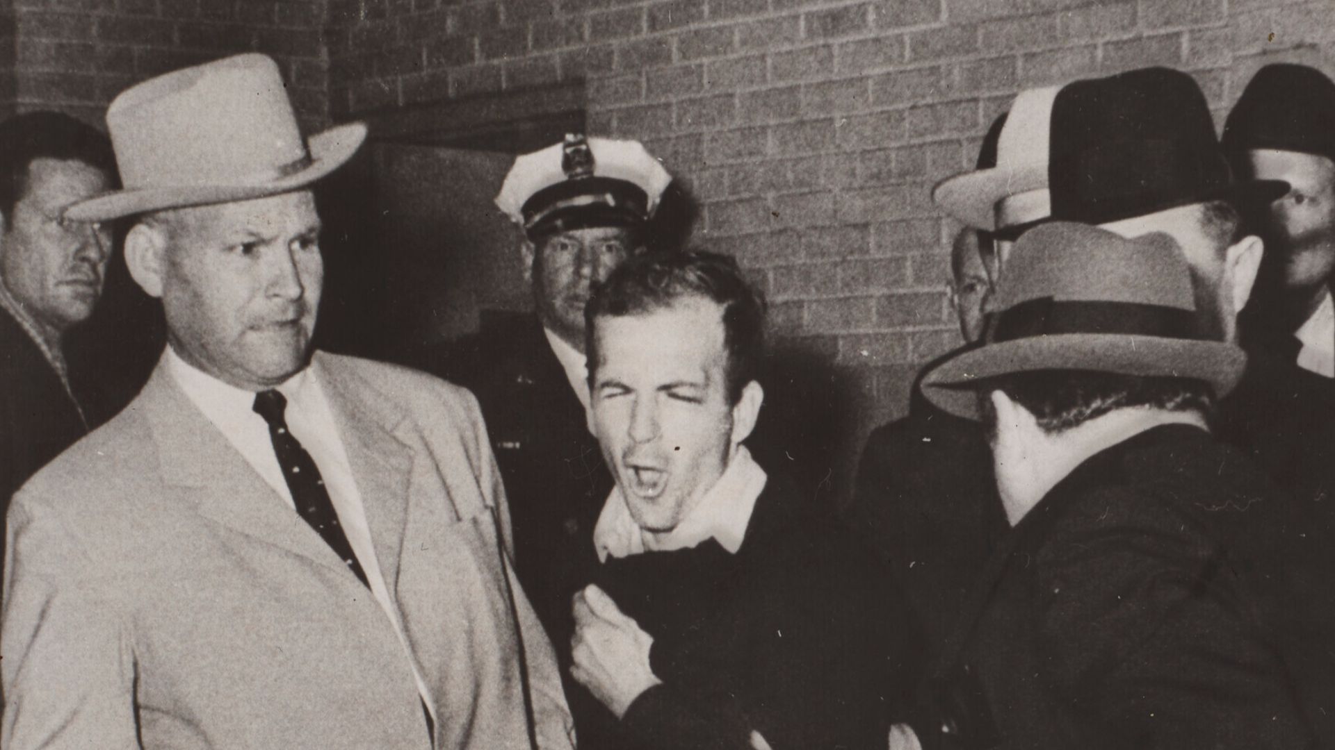 Jack Ruby (52) shoots Lee Harvey Oswald (24). Winner of the 1964 Pulitzer Prize for Photography.