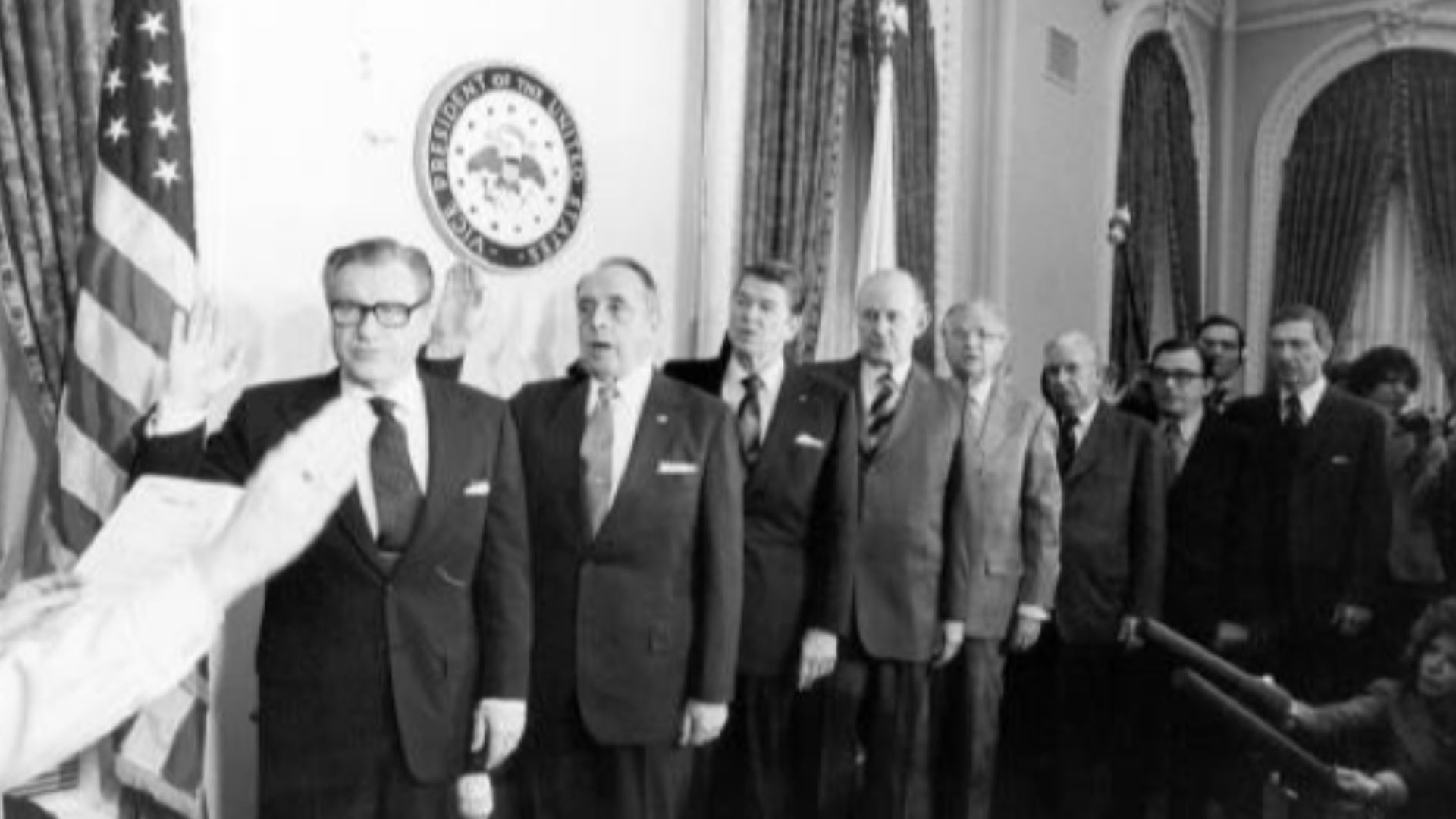 Swearing-in Ceremony of the Rockefeller Commission, the 1975 United States President's Commission on CIA activities within the United States, headed by Nelson Rockefeller: Members included Nelson A. Rockefeller, Lyman L. Lemnitzer, Ronald Reagan, Edgar F. Shannon, Jr., David W. Belin, John T. Connor, C. Douglas Dillon, Erwin N. Griswold, and Lane Kirkland