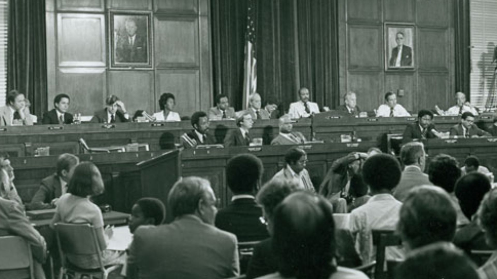 United States House Select Committee on Assassinations. Representatives Yvonne Brathwaite Burke of California, Harold Ford, Sr., of Tennessee, Walter Fauntroy of the District of Columbia, and Louis Stokes of Ohio were members of the House Select Committee on Assassinations. The committee, chaired by Stokes, investigated the assassinations of Dr. Martin Luther King, Jr., and President John F. Kennedy. In this image of a committee hearing, Burke (upper left), Fauntroy (second from upper left), and Stokes (fifth from upper left) listen to witness testimony.