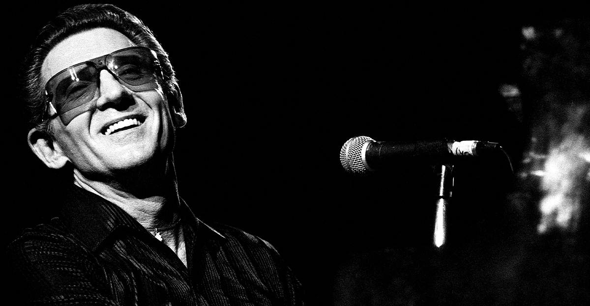 Black and white image of Jerry Lee Lewis in concert.