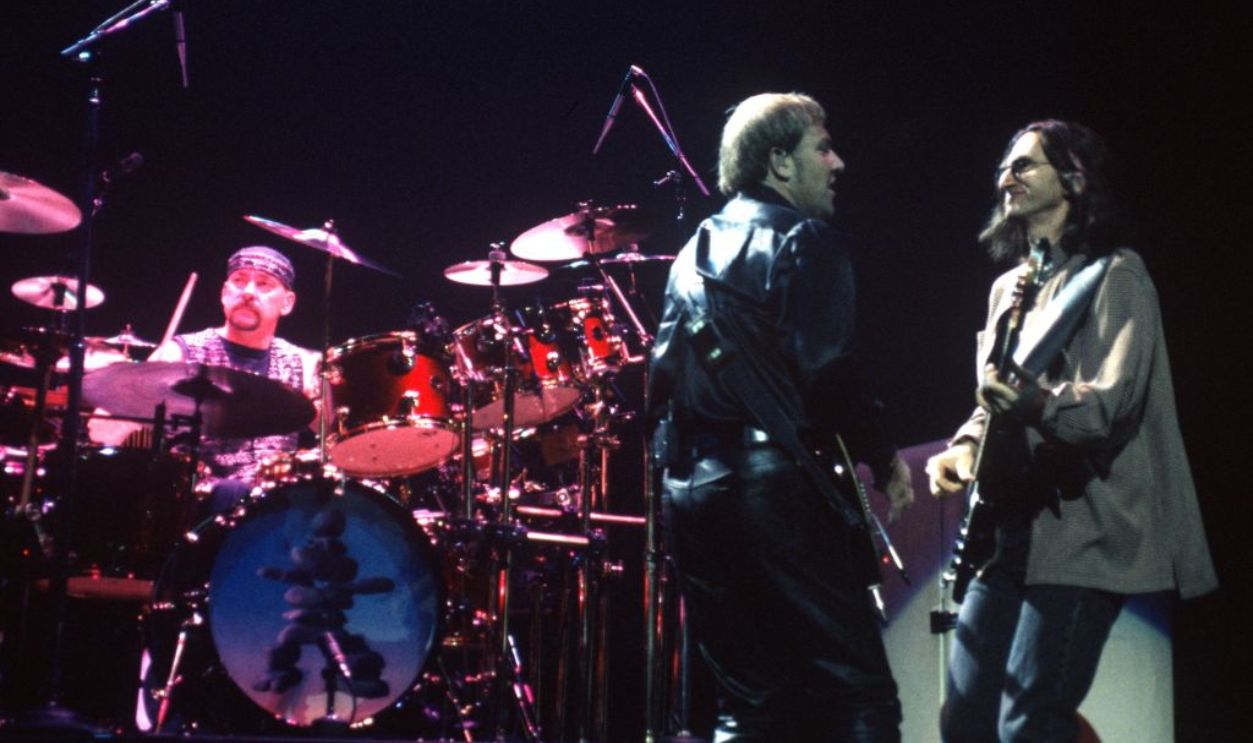 (L-R) Neil Peart, Alex Lifeson, and Geddy Lee of Rush perform at San Jose Arena on November 20, 1996 in San Jose, California. 