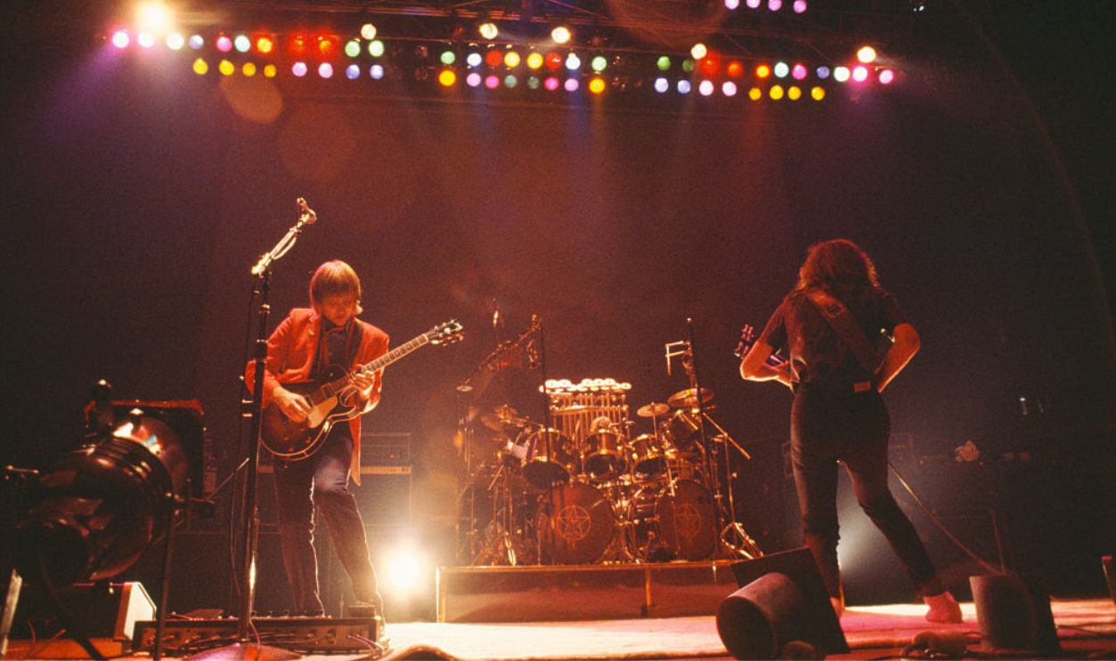 Alex Lifeson, Neil Peart, Geddy Lee of Canadian progressive rock trio, Rush, performing on stage, United States, 18th May 1981. 