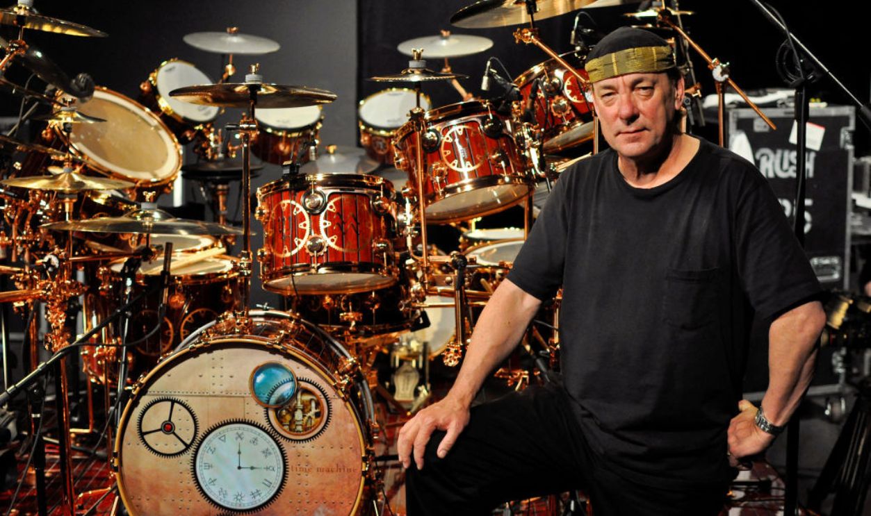 OXNARD, UNITED STATES - MAY 12: Neil Peart of Rush poses for a portrait with his DW drum kit on the Drum Channel soundstage on May 12, 2010 in Oxnard, California, United States. 