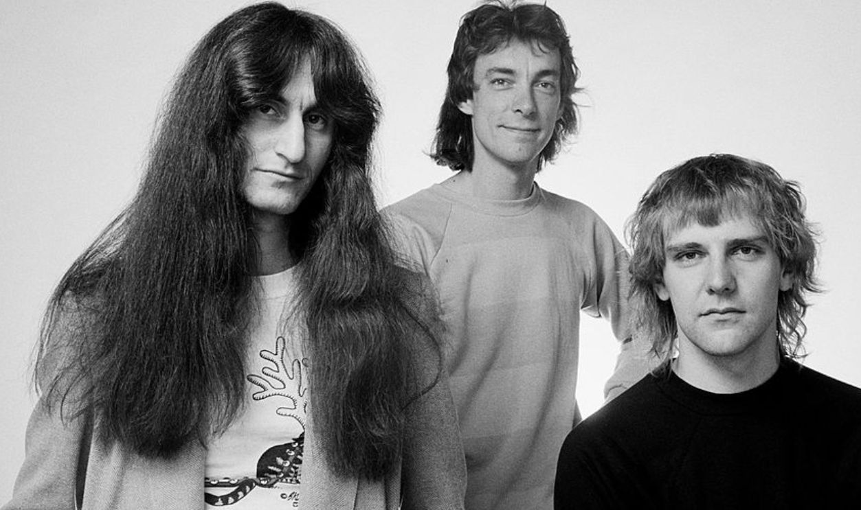 LONDON - 1st JUNE: Bassist Geddy Lee, drummer Neil Peart and guitarist Alex Lifeson from Canadian Progressive rock group Rush posed in London during the Permanent Waves tour of England in June 1980.
